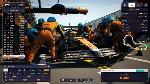 F1 Manager 2023 gameplay screenshot showing a McLaren pit stop in action, with the pit crew working on Lando Norris' car. Get your F1 Manager 2023 Deluxe Edition PC Steam CD Key at RushGame.co and manage real-time race strategies like a pro