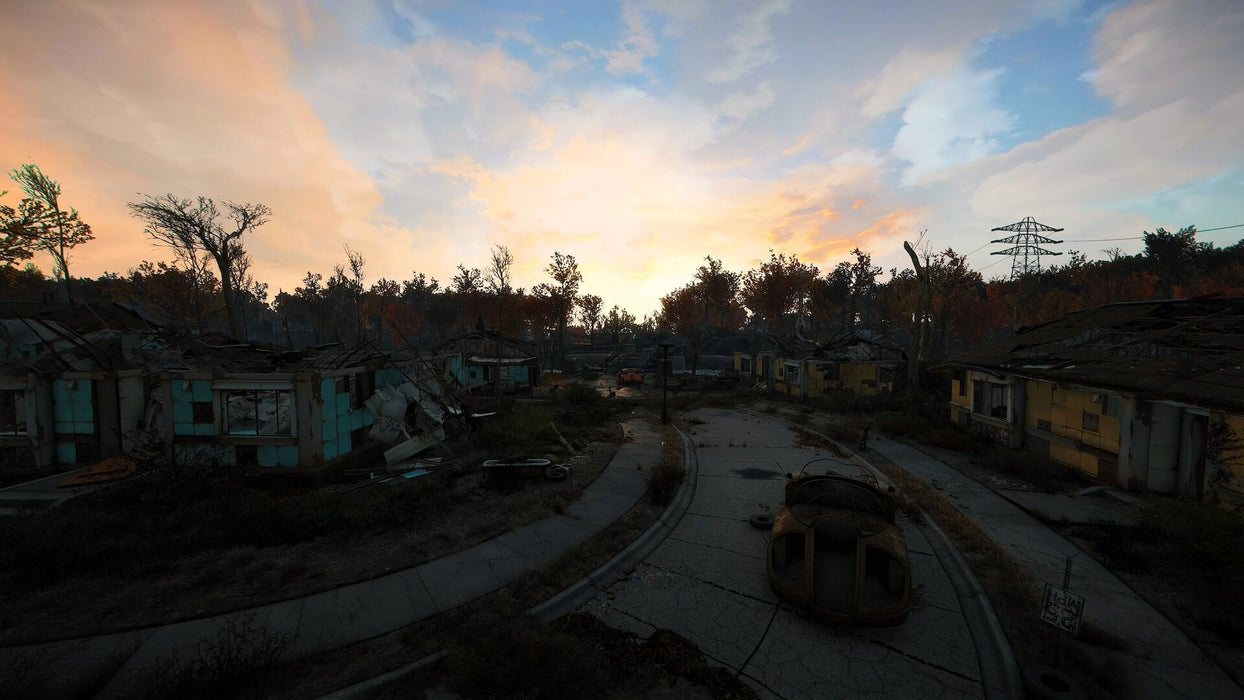 Gameplay screenshot - Post-apocalyptic suburban landscape in Fallout 4: Game of the Year Edition on PC. A ruined neighborhood with abandoned houses, rusted cars, and overgrown vegetation under a dramatic sunset sky. Experience the vast open world with your Fallout 4 GOTY CD key from RushGame.co