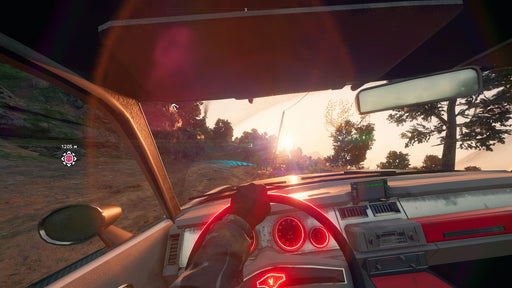 Gameplay screenshot - Driving at Sunset - Immersive first-person driving scene from Far Cry: New Dawn on PC, showing the player behind the wheel of a retro-styled car with glowing red dials, heading into a scenic sunset. Secure your Ubisoft Connect digital game code today at RushGame.co