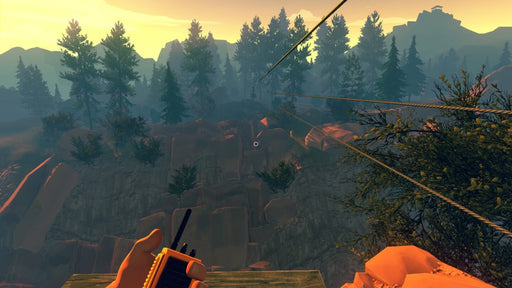 Gameplay screenshot from Firewatch for PC showing a scenic view of lush forests and rocky terrain during exploration. Purchase your Firewatch GOG PC CD Key securely at RushGame.co and start your adventure today