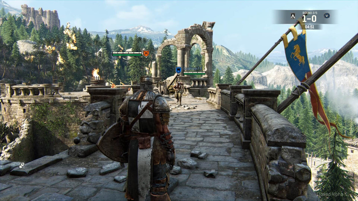 In-game screenshot of For Honor for PC showing an intense duel on a medieval stone bridge, surrounded by a stunning mountain landscape. Experience epic battles by purchasing your Ubisoft Connect CD Key at RushGame.co
