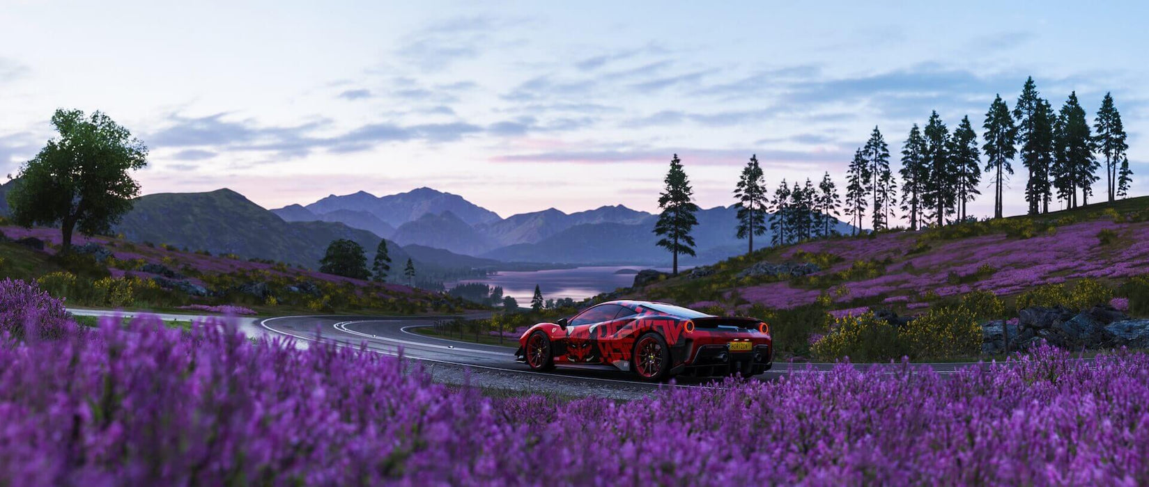 Gameplay Screenshot - An intense racing moment in Forza Horizon 4 Ultimate Edition, showing a red Ferrari racing through scenic countryside roads lined with purple flowers and mountain views. Buy your digital game code instantly at RushGame.co and race across breathtaking landscapes