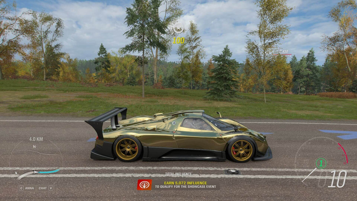 Gameplay Screenshot 4 - A gold Pagani Zonda R speeding down an open road in Forza Horizon 4 Ultimate Edition, capturing the excitement of high-performance racing. Get your instant activation key at RushGame.co and take on the ultimate open-world driving experience.
