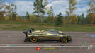 Gameplay Screenshot 4 - A gold Pagani Zonda R speeding down an open road in Forza Horizon 4 Ultimate Edition, capturing the excitement of high-performance racing. Get your instant activation key at RushGame.co and take on the ultimate open-world driving experience.
