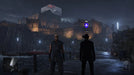 Hitman World of Assassination epic games - Agent 47 standing in front of a castle at night