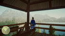 Lake Steam PC game - Main character standing on a wooden deck near a lake