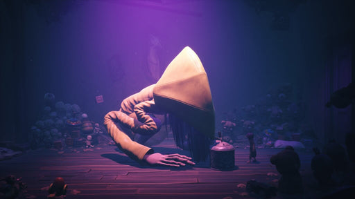 The protagonist encounters a giant figure wearing a yellow raincoat in a creepy toy-filled room in Little Nightmares II PC Steam Key. Find the best deals on Steam Keys at RushGame.co and experience the suspense