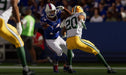 A dramatic close-up in Madden NFL 23 Xbox Series X/S, with a Buffalo Bills player facing off against a Green Bay Packers defender during a dynamic play. Buy Madden NFL 23 Xbox Key on RushGame.co now