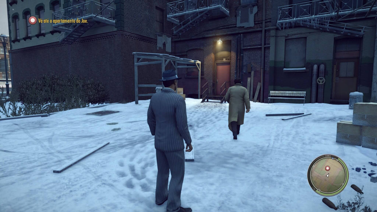 A snowy scene as two characters walk through an alley in Mafia II Definitive Edition PC Steam. RushGame.co offers Mafia II Definitive Edition with instant delivery for the ultimate mobster adventure.