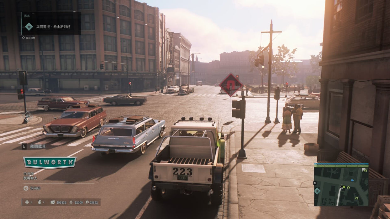 A stunning daytime street scene in Mafia III Definitive Edition on Steam, showcasing the detailed city environment as cars fill the roads. Explore this immersive world and get your steam game key at RushGame.co