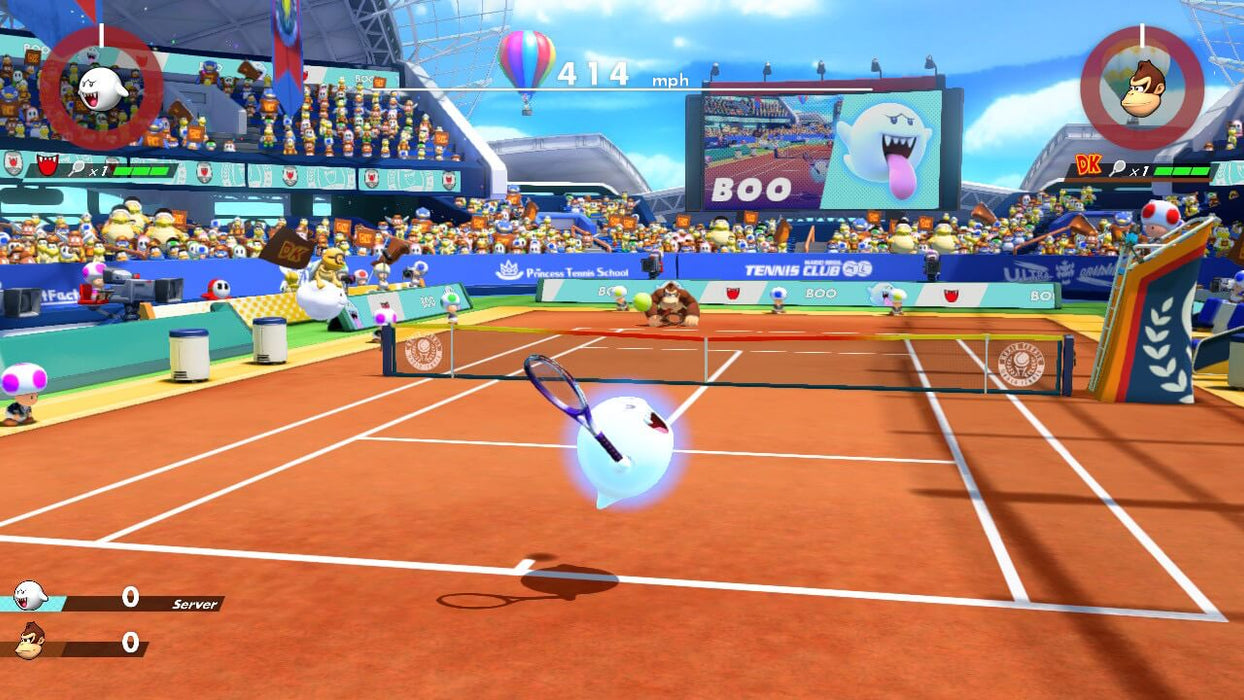 Boo returns a fast serve on a clay court in Mario Tennis Aces for Nintendo Switch. Play as your favorite characters and get your game key today from RushGame.co