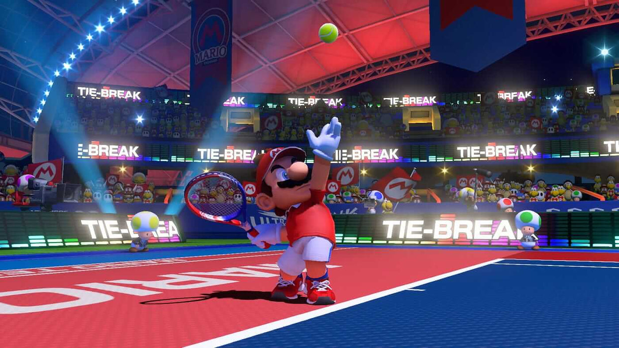 Mario prepares to serve in a high-stakes match at night under bright lights in Mario Tennis Aces on Nintendo Switch. Join the action and pick up your game key at RushGame.co