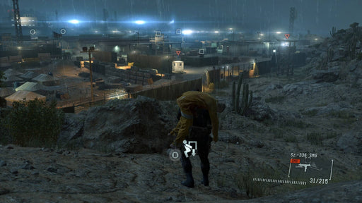 Snake sneaks through a rainy night, carrying a captive towards an enemy base in Metal Gear Solid V: Ground Zeroes on PC Steam. Get your key at RushGame.co