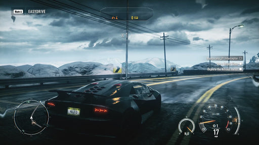 Gameplay of a Lamborghini in Need for Speed Rivals on PC EA Play – A Lamborghini speeds along a mountain road, leaving the competition behind. The nitrous meter and other interface elements highlight the car's performance in this action-packed race. Available at RushGame.co