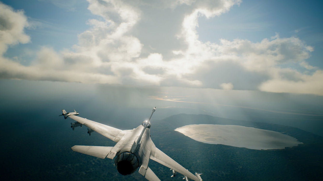 A fighter jet approaching a mission target in ACE COMBAT 7: SKIES UNKNOWN, with stunning visual effects and gameplay. Secure your xbox game key instantly at RushGame.co!