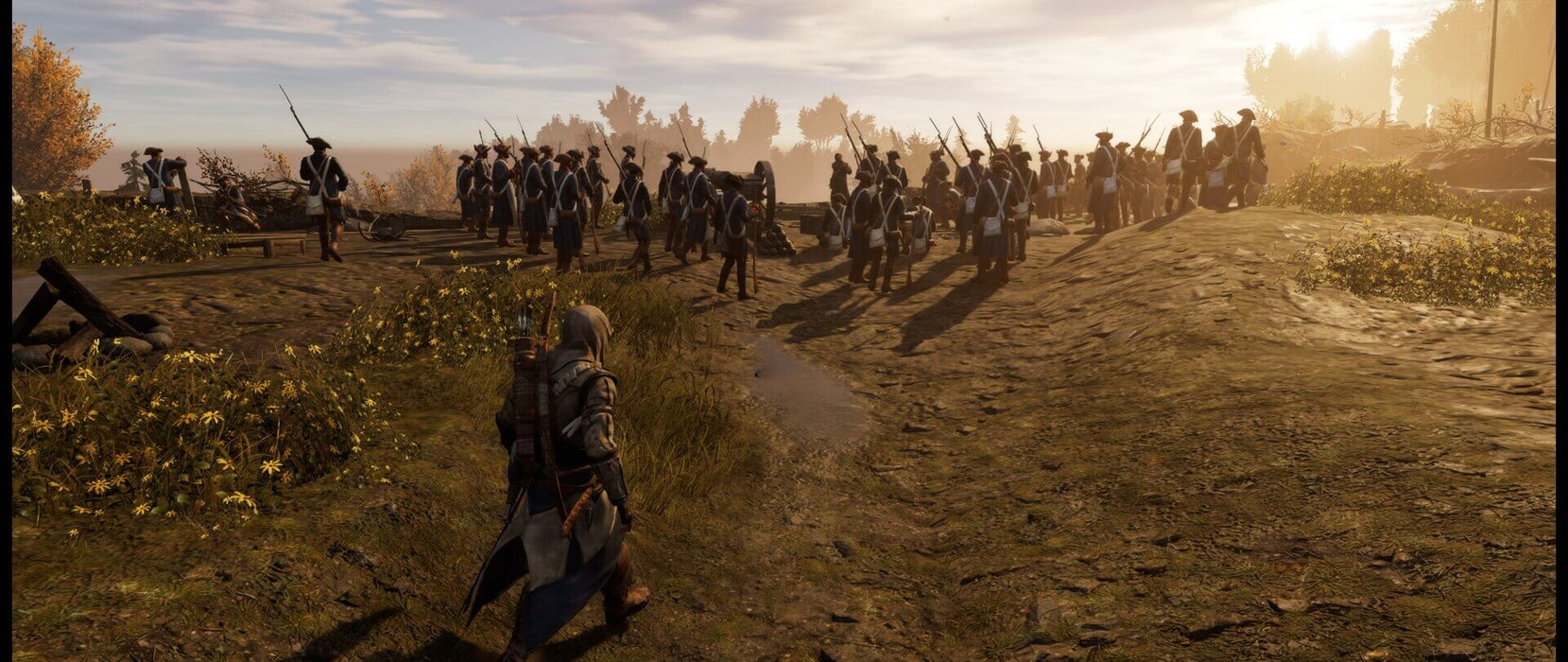 A battlefield scene from Assassin's Creed III Remastered, where a group of soldiers in Revolutionary War uniforms stand in formation, preparing for battle at sunset. Relive history with the Assassin's Creed III Remastered PC Ubisoft Connect CD Key, available with digital activation at RushGame.co