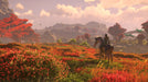 A Na'vi rider explores an expansive, autumn-colored valley on a majestic alien mount, with towering cliffs and a glowing sky in the distance. This in-game screenshot from Avatar: Frontiers of Pandora highlights the open-world adventure awaiting—buy your digital activation code now at RushGame.co