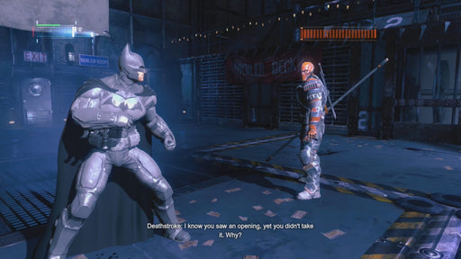 A tense in-game moment from Batman: Arkham Origins, showing Batman preparing to battle the deadly mercenary Deathstroke inside a dimly lit industrial complex. Buy Batman: Arkham Origins PC Steam CD Key at RushGame.co and take on Gotham’s deadliest assassins