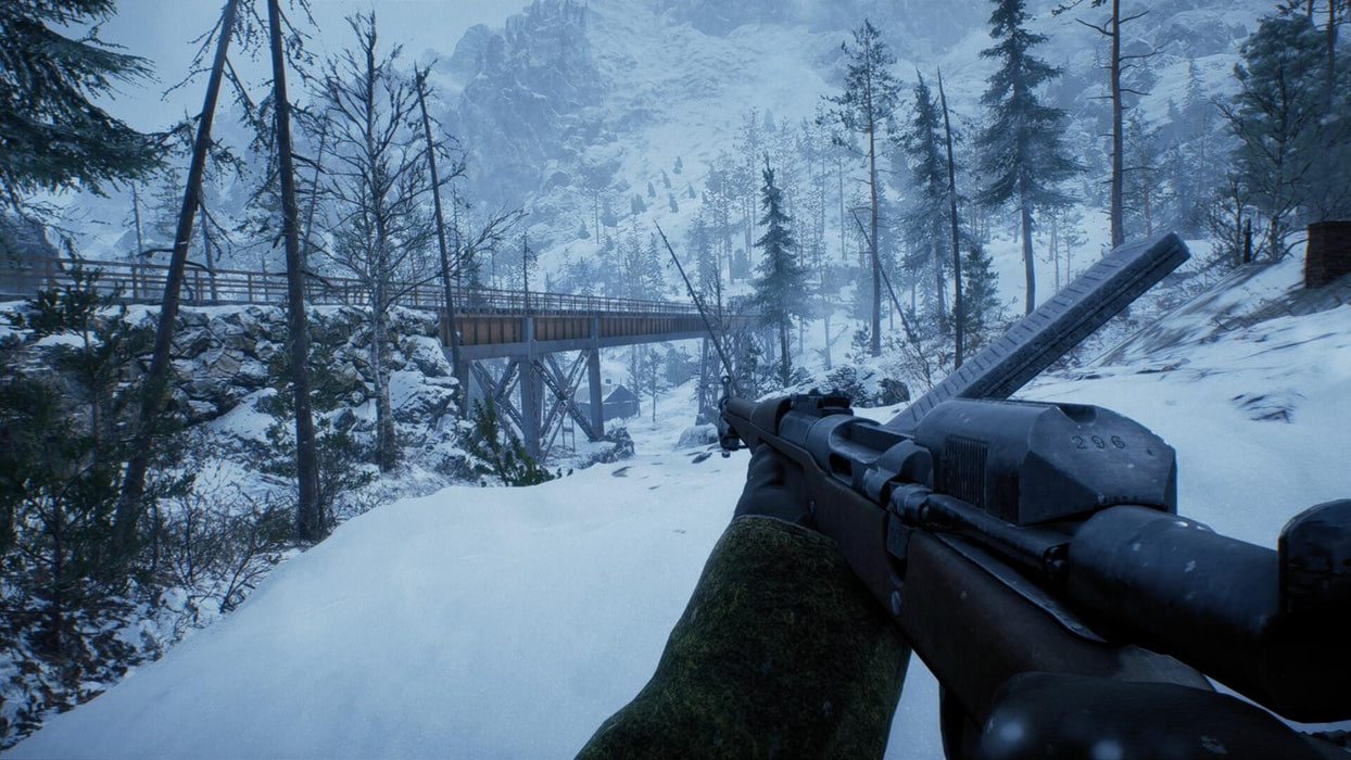 Battlefield 1 Gameplay – Snowy Mountain Warfare – A first-person perspective of a soldier wielding a vintage rifle in a snow-covered battlefield, with a wooden bridge stretching across the valley. Secure your Battlefield 1 Deluxe Edition PC Key at RushGame.co and fight through the brutal landscapes of World War I