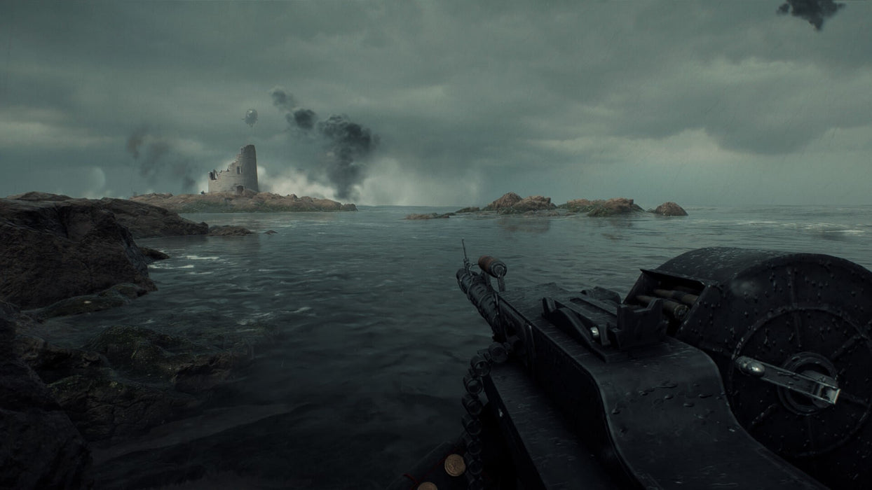 Battlefield 1 Gameplay – Coastal Combat Scene – A soldier holding a mounted machine gun overlooking a stormy coastal battlefield, with smoke rising from a ruined structure in the distance. Buy your Battlefield 1 PC CD Key from RushGame.co for an immersive war experience across land, sea, and air