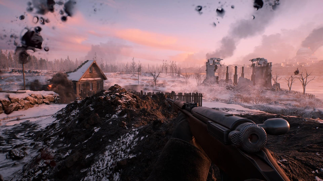 Battlefield 1 gameplay screenshot - trench warfare
A war-torn environment in Battlefield 1, showing a destroyed village covered in snow, with smoke and explosions filling the background as a soldier holds a bolt-action rifle. Secure your Battlefield 1 Deluxe Edition Xbox One CD Key now at RushGame.co and dive into the action