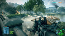 Battlefield 3 squad-based warfare scene, with medics assisting fallen soldiers on a war-torn battlefield
