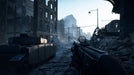 A gripping Battlefield V war zone, showing a player advancing through a devastated urban battlefield, with a tank positioned beside crumbling buildings. Get your EA Play Origin CD Key now at RushGame.co.