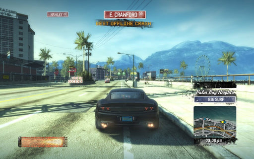 Burnout Paradise Remastered PC EA Play Screenshot 2
A sleek black sports car drives through the open roads of Palm Bay Heights in Burnout Paradise Remastered, with a scenic mountain backdrop and palm trees lining the street