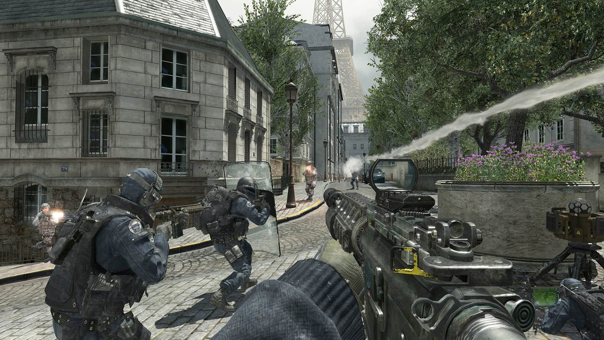 Multiplayer Action in an Urban Battlefield – A chaotic multiplayer match with soldiers engaged in a firefight in a European-style city, featuring realistic urban combat and intense gunplay. Unlock Modern Warfare III Cross-Gen Bundle at RushGame.co and dive into fast-paced multiplayer action with cutting-edge graphics