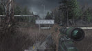 Gameplay Screenshot 
A first-person perspective of a sniper hidden in tall grass near the entrance to Pripyat, Ukraine, in Call of Duty: Modern Warfare Remastered. Buy your digital activation key for Xbox One at RushGame.co and experience the legendary "All Ghillied Up" mission in stunning remastered