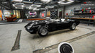Gameplay screenshot: Black convertible in detailing shop)

A beautifully polished black convertible in Car Detailing Simulator on PC Steam, ready for the final touches. Clean, restore, and customize cars—buy your digital game key at RushGame.co today!