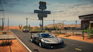 Gameplay screenshot: Modified sports car on Route 66-
A sleek, modified sports car parked near an auto repair shop on Route 66 in Car Mechanic Simulator 2021 on PC Steam. Explore new repair challenges—get your digital game key instantly at RushGame.co!