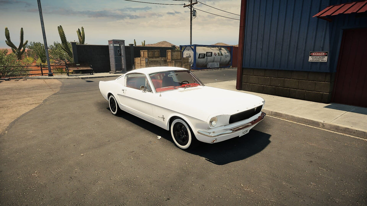 gameplay screenshot: A beautifully restored white classic muscle car in Car Mechanic Simulator 2021 on PC Steam, parked in a small desert town. Experience detailed car restoration—buy your Steam CD key now at RushGame.co!