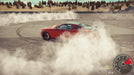 gameplay screenshot: A high-performance sports car drifting and generating a smoke trail in Car Mechanic Simulator on Xbox One. Experience realistic driving physics—buy your Xbox digital key now at RushGame.co