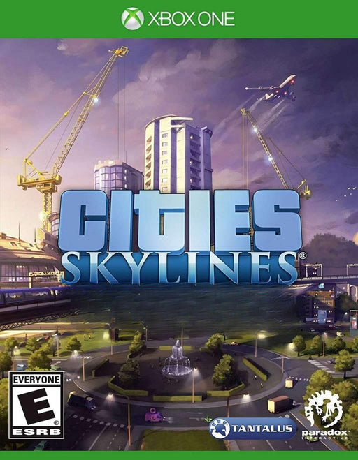 Cover image for Cities: Skylines on Xbox One, featuring a futuristic city skyline under construction with towering cranes and modern buildings. Get your Cities: Skylines Xbox One CD Key instantly at RushGame.co and start building your dream city today