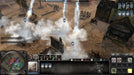 Gameplay screenshot: Tactical warfare in Company of Heroes 2, featuring artillery strikes devastating enemy positions amid a foggy battlefield. Command your troops with strategic precision—get your PC Steam CD Key instantly from RushGame.co