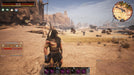 A player character in Conan Exiles stands in a desert biome wearing a black hooded outfit with glowing tribal patterns, holding a bow. The HUD displays survival objectives and combat statistics. Explore the vast open world of Conan Exiles by getting your Steam CD Key at RushGame.co today