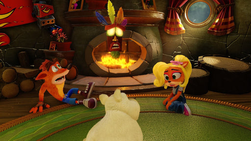 A cozy in-game scene from Crash Bandicoot N. Sane Trilogy, showing Crash and Coco Bandicoot sitting on a green carpet near a fireplace with Aku Aku floating above them. The warm lighting and detailed textures bring a nostalgic yet refreshed look to this beloved classic. Get your digital key at RushGame.co