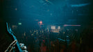 Cyberpunk 2077 PC GOG CD Key - Screenshot 4 – A dynamic concert scene inside a cyberpunk nightclub, viewed from the perspective of a guitarist on stage. The crowd is immersed in the music, dancing under neon lights. Experience the immersive world of Cyberpunk 2077—buy your game key now at RushGame.co