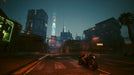 Cyberpunk 2077: Motorcycle at Night gameplay screenshot – A lone biker rides through the neon-lit streets of Night City at night in Cyberpunk 2077: Phantom Liberty. The skyline glows with towering advertisements, setting the mood for an intense cyberpunk experience. Secure your Cyberpunk 2077: Phantom Liberty DLC Key at RushGame.co