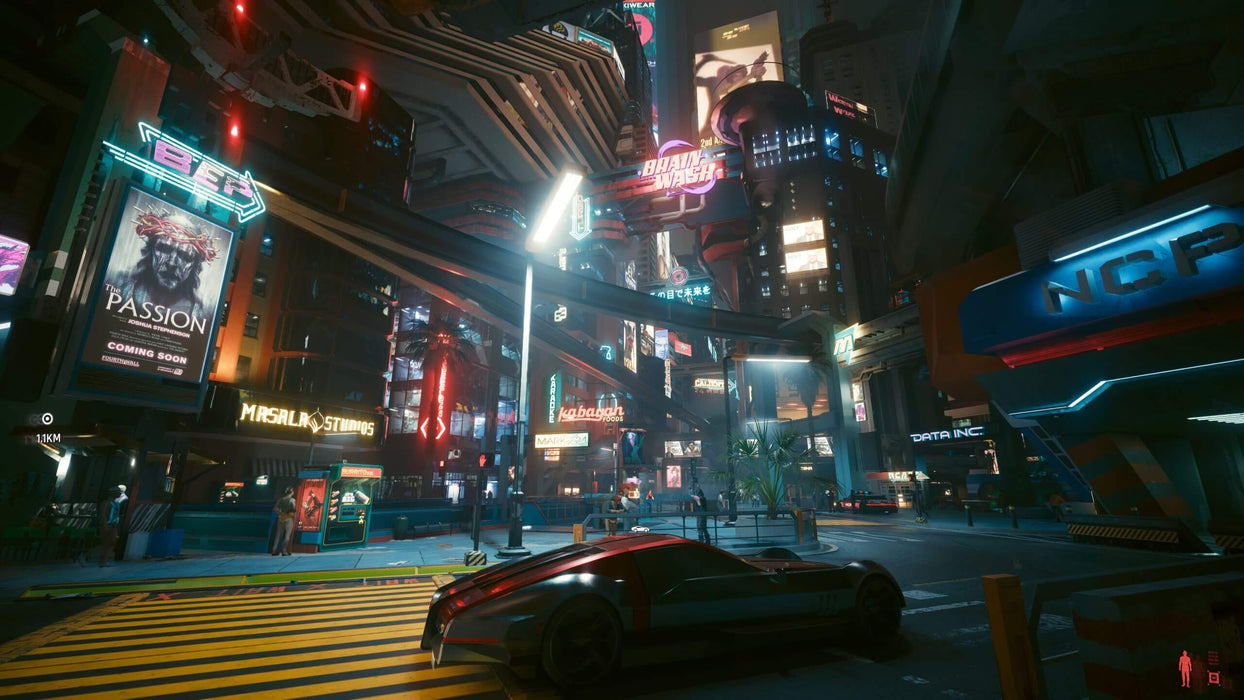 Cyberpunk 2077 Phantom Liberty PC DLC - gameplay screenshot
A vibrant night-time scene in Cyberpunk 2077: Phantom Liberty, showcasing the bustling streets of Night City illuminated by neon signs and holographic billboards. A sleek futuristic car is parked at an intersection, adding to the immersive cyberpunk aesthetic. Get your Cyberpunk 2077 Phantom Liberty DLC key today at RushGame.co.