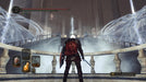 gameplay screenshot: A heavily armored character approaches an imposing icy fortress, with ethereal light illuminating the surroundings in Dark Souls II: Scholar of the First Sin. Get your Steam CD Key instantly from RushGame.co