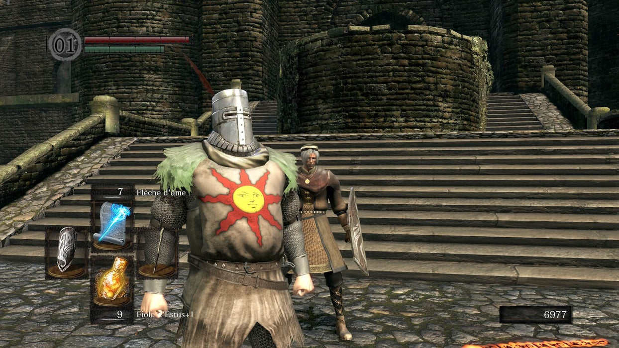 Dark Souls Remastered PC Gameplay – Solaire of Astora – The legendary warrior Solaire, wearing his distinctive sun-emblazoned armor, stands in a medieval fortress, ready for battle. A player character observes from behind, capturing the camaraderie and lore-rich world of Dark Souls Remastered. Get your Steam CD Key at RushGame.co and embark on an unforgettable journey