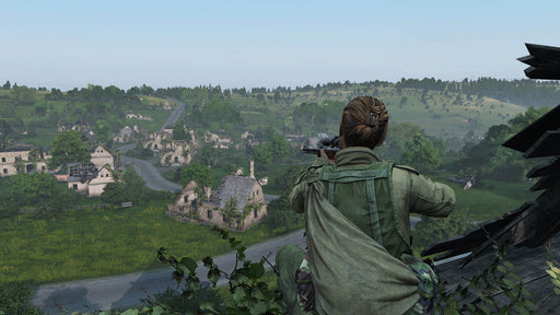 gameplay screenshot: A female survivor in tactical gear is perched on the remains of a destroyed building, aiming a sniper rifle towards a desolate countryside filled with abandoned houses and overgrown vegetation. This tense moment captures the essence of survival in the open-world experience of DayZ. Get your Steam key now at RushGame.co