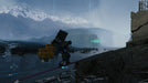 gameplay screenshot: River Crossing Scene: "Sam Porter Bridges cautiously crosses a river in Death Stranding Director's Cut on PC, balancing heavy cargo in a stunning open-world environment. Secure your digital game key today at RushGame.co.