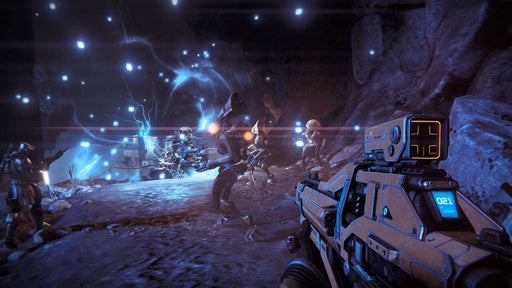 "An intense combat scene from Destiny: The Collection on Xbox One, showing the player engaging in a firefight against robotic enemies in a dark cavern. Energy blasts and explosions illuminate the battle. Buy your game key now at RushGame.co