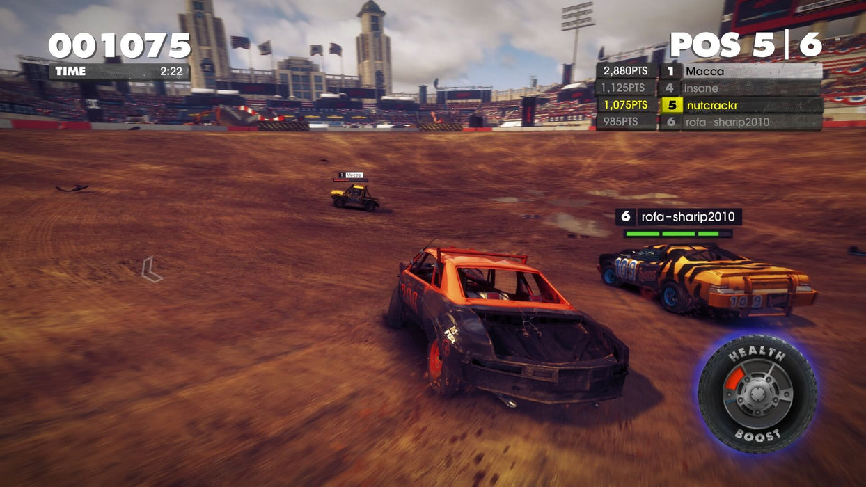  In-game screenshot from DiRT Showdown, showcasing a demolition derby-style race in a dirt arena. Multiple vehicles, including a heavily damaged orange muscle car, compete for survival while points and health meters are displayed. Get your Steam key at RushGame.co