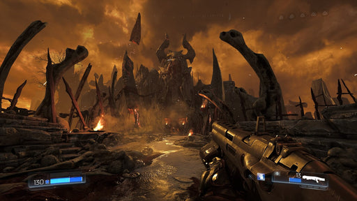 Gameplay screenshot - A menacing hellish environment from DOOM on Xbox One, featuring a towering demon-infested fortress surrounded by flames and skeletal remains. Conquer the underworld—purchase your DOOM Xbox One CD Key at RushGame.co today