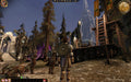 Gameplay screenshot - A warrior stands in Ostagar, a key location in Dragon Age: Origins, surrounded by soldiers and ancient ruins. Prepare for an epic fantasy battle—buy your Dragon Age: Origins - Ultimate Edition PC GOG CD Key now at RushGame.co