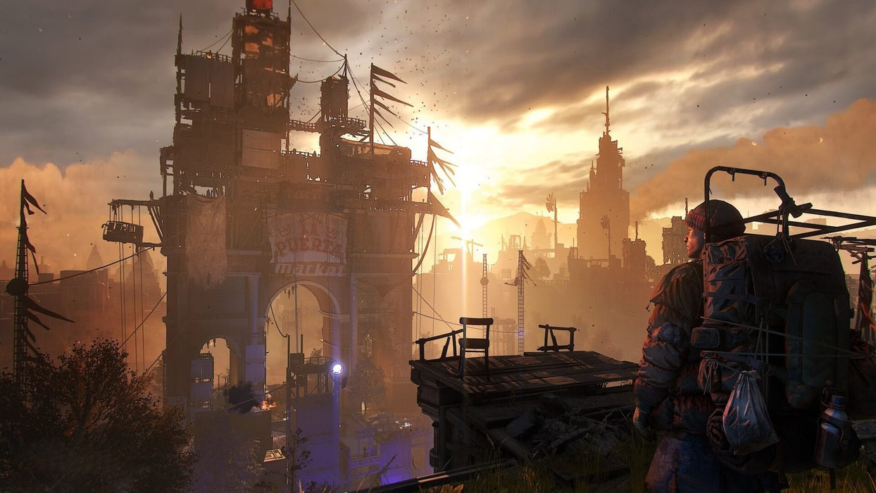 Gameplay screenshot - Stunning post-apocalyptic cityscape at sunset in Dying Light 2: Reloaded Edition on PC Steam. A lone survivor overlooks a towering fortress with makeshift defenses and banners, setting the tone for immersive open-world exploration. Buy your Dying Light 2 Reloaded PC Steam CD Key today at RushGame.co!